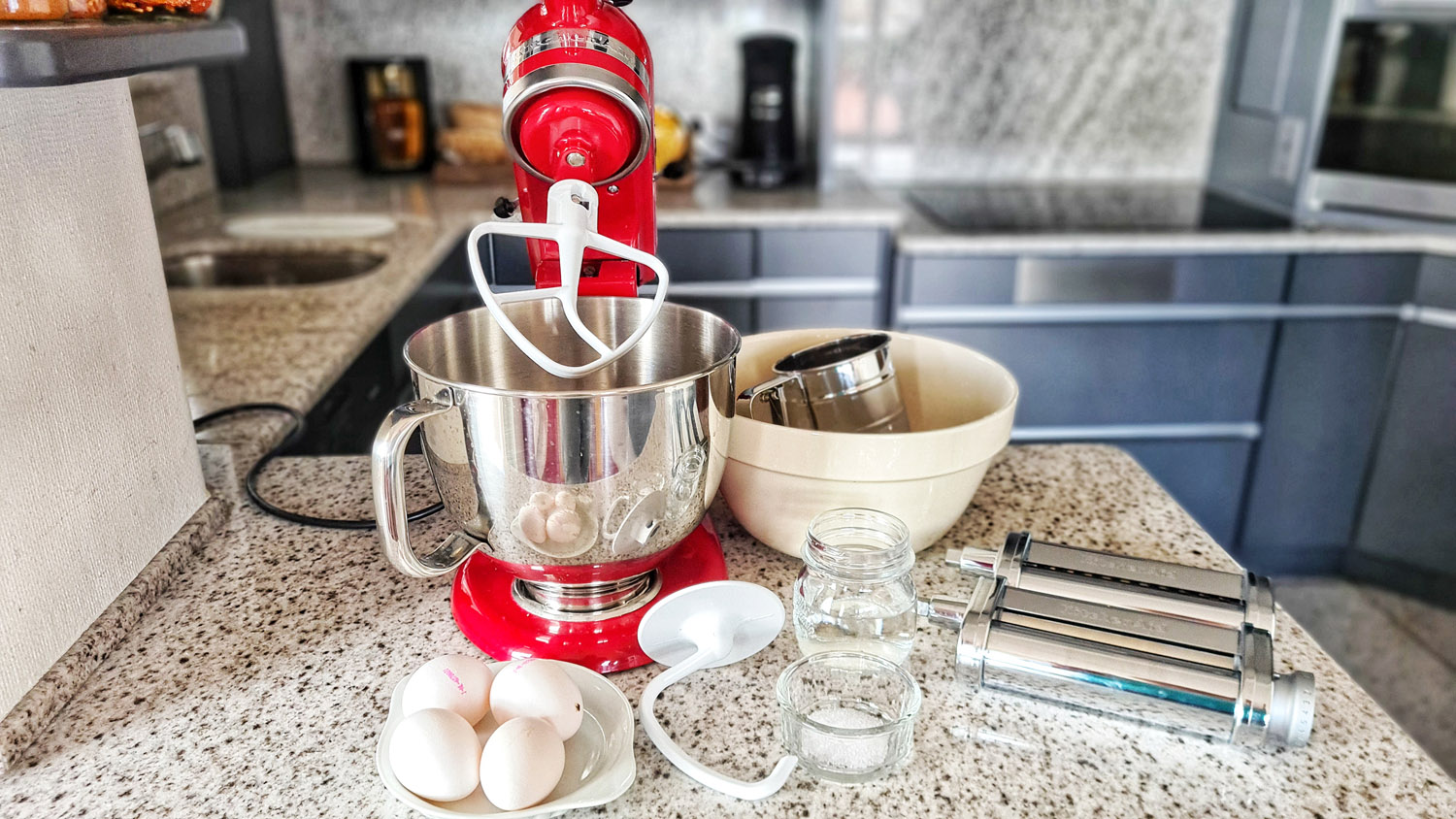 Ingredients and KitchenAid setup for homemade fettuccine.