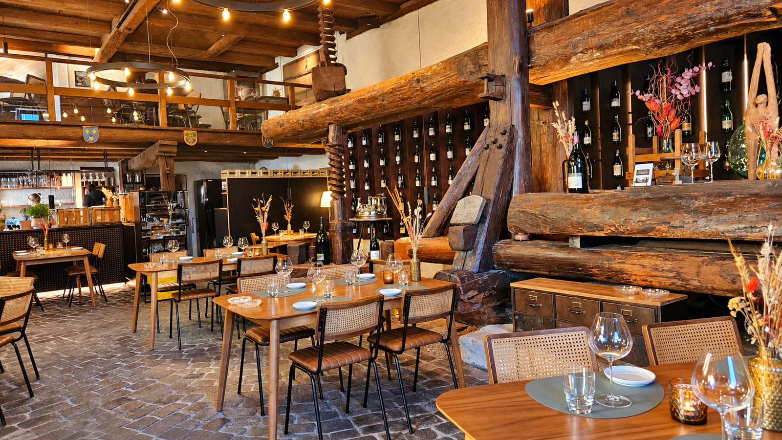 Historic interior and old wine press at Alter Torkel Jenins