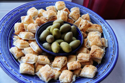 Olives and puff pastry appetisers by Angela Carnelutti in Zurich
