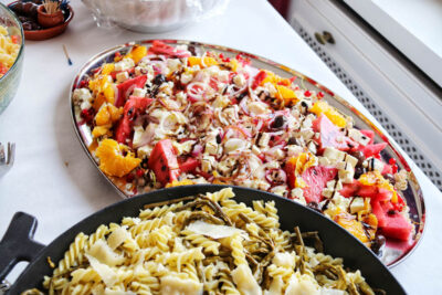 Angela Carnelutti – Italian Catering Zurich Italian pasta with vegetables and colourful Mediterranean salad by Angela Carnelutti in Zurich