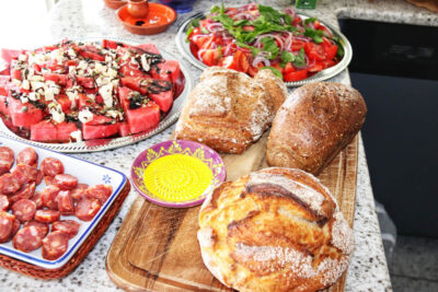 Angela Carnelutti – Italian Catering Zurich Rustic Italian bread, fresh salads and sausage by Angela Carnelutti in Zurich