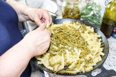 Angela Carnelutti – Italian Catering Zurich Preparing Italian pasta with green beans by Angela Carnelutti in Zurich