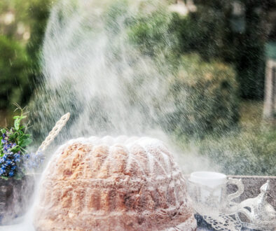 Freshly baked Gugelhupf dusted with powdered sugar