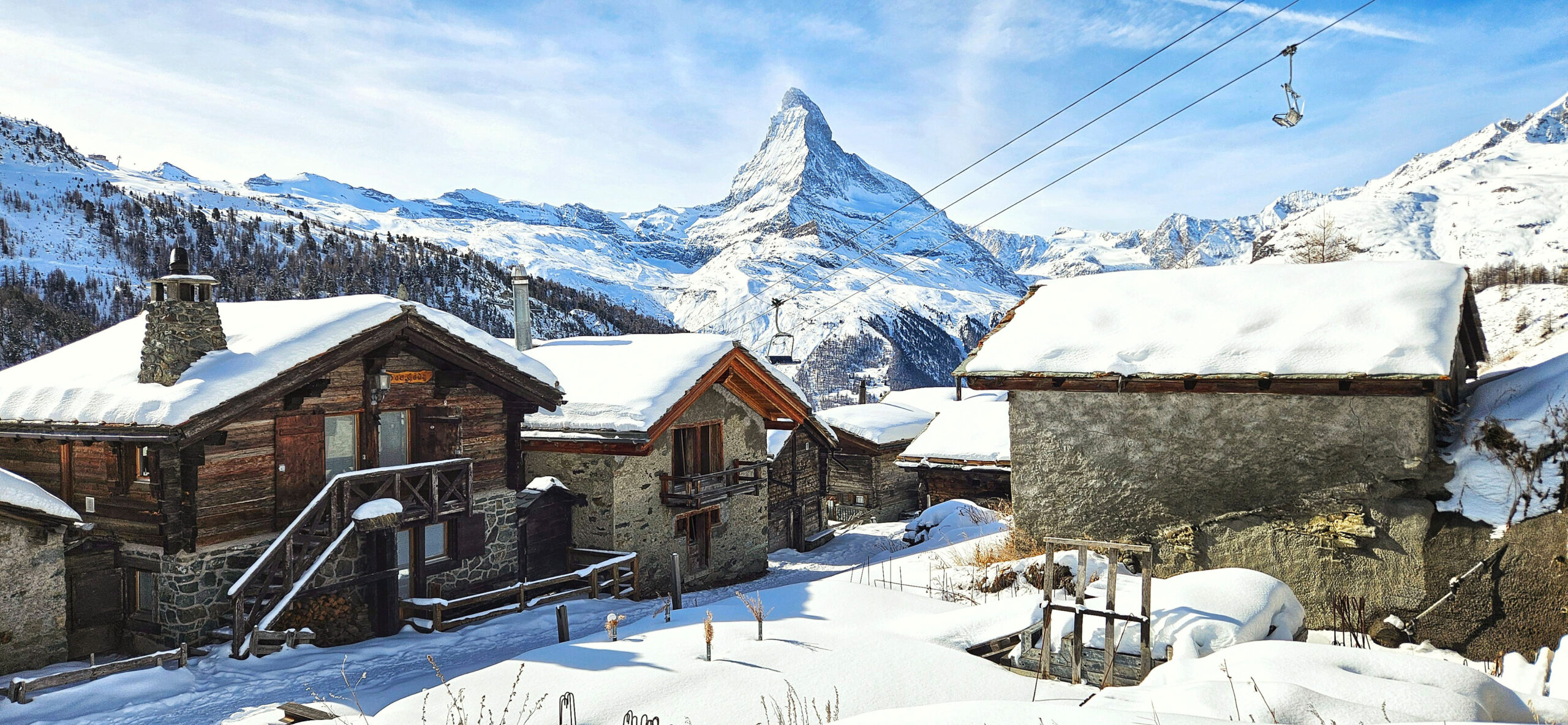 Traditional winter chalets in Zermatt with the Matterhorn in the background