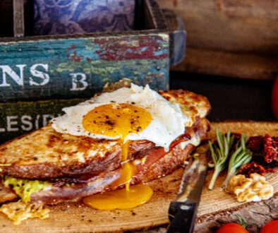 Croque Madame de Lux with fried egg, avocado, crispy bacon, ham and melted cheese, prepared by Alessandro Cipriano